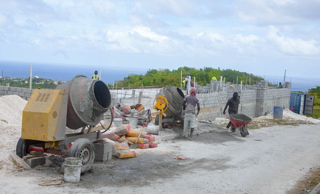 Contractor team shaking hands on site